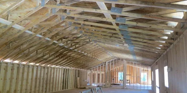 17 Oaks Plantation — interior ceiling trusses and framing under construction